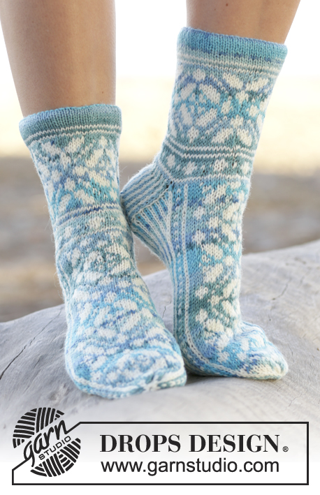 Ice Magic / DROPS 161-36 - Knitted DROPS socks with Norwegian pattern in Fabel.