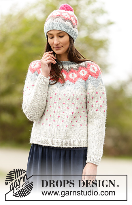 Winter Poppies / DROPS 164-28 - Set consists of: Knitted DROPS jumper with round yoke and Nordic pattern and hat with Nordic pattern and pompom in Andes. Size: S - XXXL.