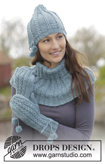 Maggie Blues / DROPS 164-38 - Set consists of: Knitted DROPS hat, neck warmer and mittens with small cables, purl stitches and pompoms in Karisma.