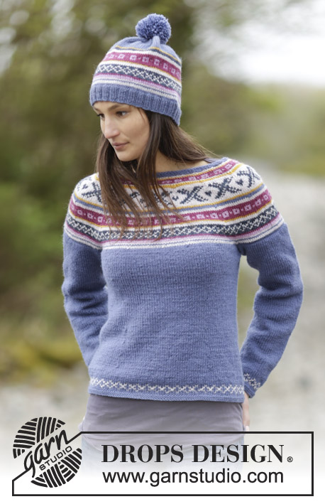 Mariuska / DROPS 165-23 - Set consists of: Knitted DROPS jumper with round yoke and Norwegian pattern and hat with Norwegian pattern and pompom in Karisma Size: S - XXXL.