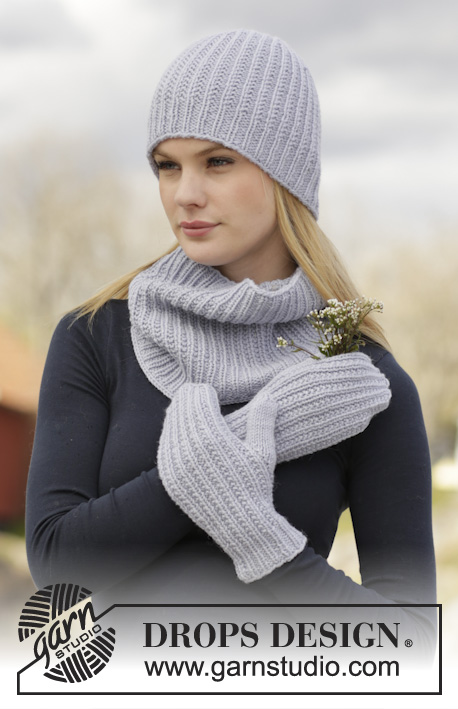 Ruth / DROPS 166-13 - Set consists of: Knitted DROPS hat, neck warmer and mittens with textured pattern in “Lima”.