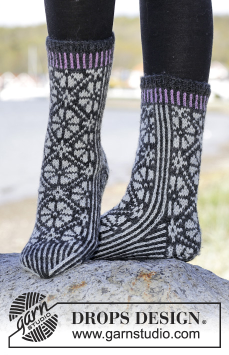 Starry Night Socks / DROPS 166-25 - Knitted DROPS socks with Nordic pattern in ”Karisma”. Size 35-43