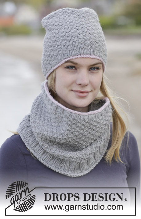 Sue / DROPS 166-39 - Set consists of: Knitted DROPS hat and neck warmer in double seed st in ”Alaska”.