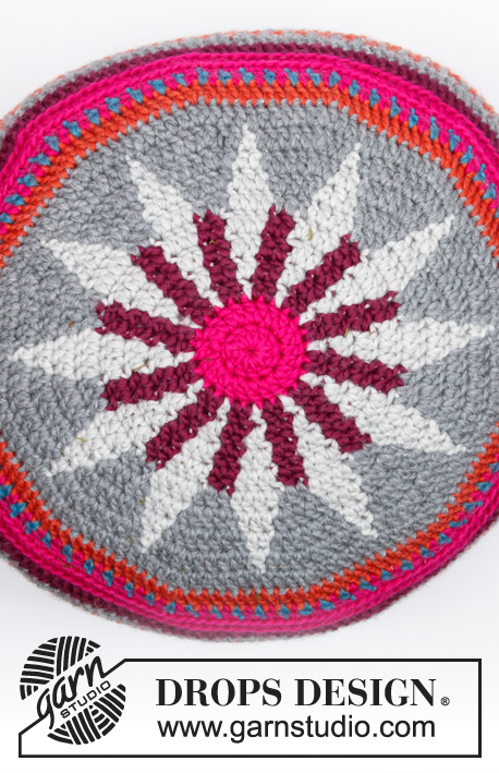 Marrakesh / DROPS 179-33 - Pouffe lavorato all’uncinetto Crochet con motivo multicolore.
Lavorato in DROPS Snow.