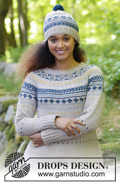 Lillehammer / DROPS 180-18 - The set consists of: Knitted hat with multi-colored Norwegian pattern and pom pom. Jumper with round yoke and multi-colored pattern, worked top down. Sizes S - XXXL.
The piece is worked in DROPS Nepal.