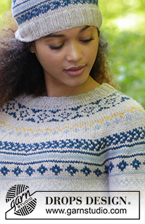 Lillehammer / DROPS 180-18 - The set consists of: Knitted hat with multi-coloured Norwegian pattern and pom pom. Jumper with round yoke and multi-coloured pattern, worked top down. Sizes S - XXXL.
The piece is worked in DROPS Nepal.
