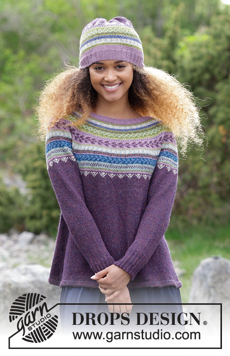 Blueberry Fizz / DROPS 180-7 - The set consists of knitted jumper with round yoke, multi-coloured Norwegian pattern and A-shape, worked top down. Sizes S - XXXL. Hat with multi-coloured Norwegian pattern.
The set is worked in DROPS Alpaca.