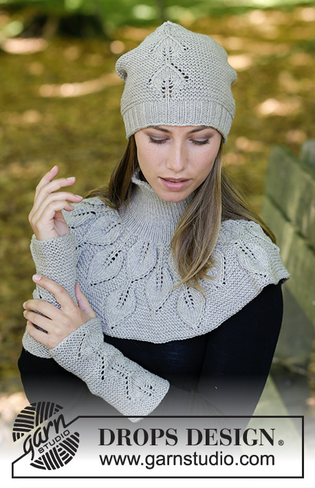 Silver Leaf / DROPS 181-35 - Set consists of: Knitted hat, neck warmer and wrist warmer with leaf pattern and garter stitch.
Set is knitted in DROPS Merino Extra Fine.