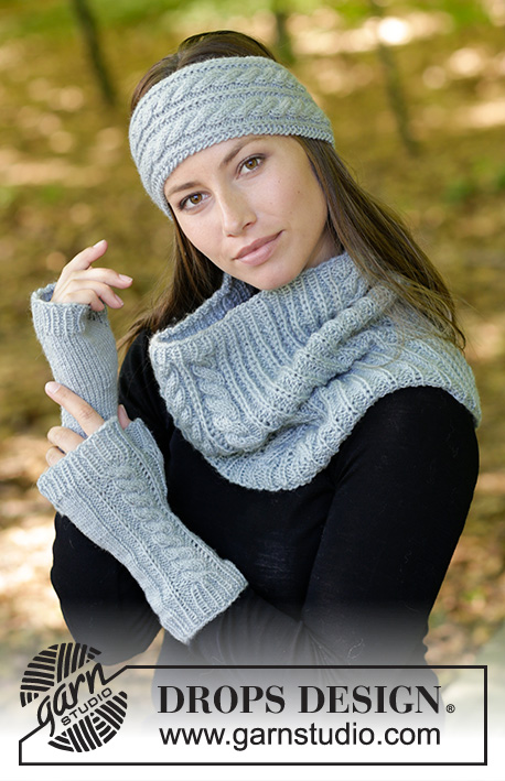 Catch Me If You Can / DROPS 182-19 - The set consists of: Knitted head band, neck warmer and wrist warmers with false Fisherman’s Rib variation and cables.
The set is worked in DROPS Karisma.