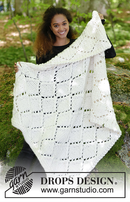Snow Diamonds / DROPS 183-14 - Knitted blanket with lace pattern.
Piece is knitted in 1 strand DROPS Polaris or 2 strands DROPS Wish.