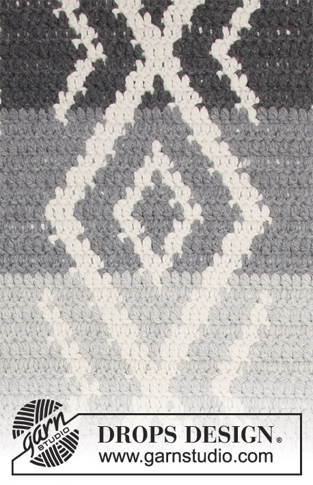 Grey Jacquard / DROPS 184-35 - Crochet floor rug with coloured pattern.
The piece is worked in 2 strands DROPS Andes.
