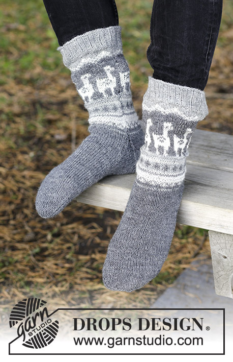 Lama Rama Socks / DROPS 185-19 - Men’s knitted socks with llama / alpaca and multicolored Nordic pattern. 
The piece is worked in DROPS Fabel.