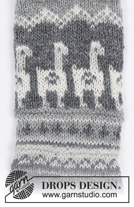 Lama Rama Socks / DROPS 185-19 - Gestrickte Socken mit mehrfarbigem Norwegermuster mit Lamas / Alpakas für Herren. Größe 35 - 46.
Die Arbeit wird gestrickt in DROPS Fabel.