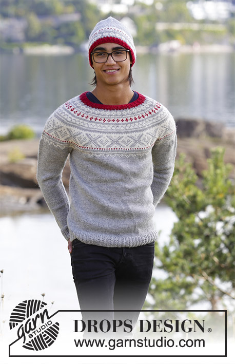 Narvik / DROPS 185-6 - The set consists of: Men’s knitted jumper with round yoke and multi-coloured Nordic pattern, worked top down and men’s knitted hat with multi-coloured Nordic pattern. Sizes S - XXXL.  
The piece is worked in DROPS Merino Extra Fine.