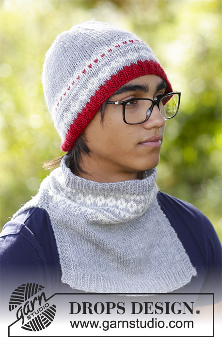 Narvik Set / DROPS 185-7 - The set consists of: Men’s knitted hat and neck warmer with multi-colored Nordic pattern.
The set is worked in DROPS Merino Extra Fine.