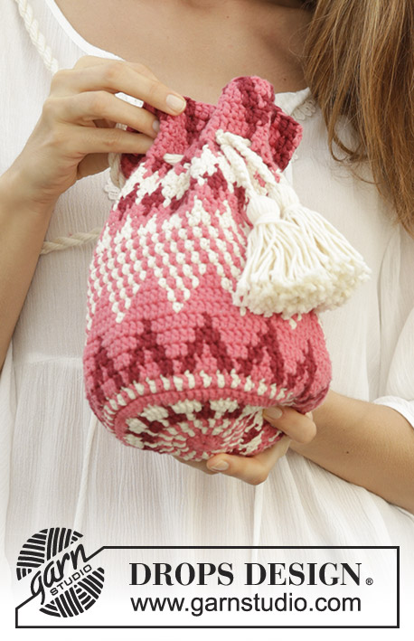 Hush Hush / DROPS 186-3 - Crochet bag with colored pattern and tassels, worked in the round from the middle of the bottom of the bag and upwards. The piece is worked in DROPS Paris.
