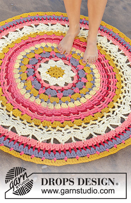 Himalaya Rose / DROPS 189-10 - Rug with lace pattern and stripes, crocheted in the round in a circle from middle and outwards. Piece is crocheted in 3 strands DROPS Paris.