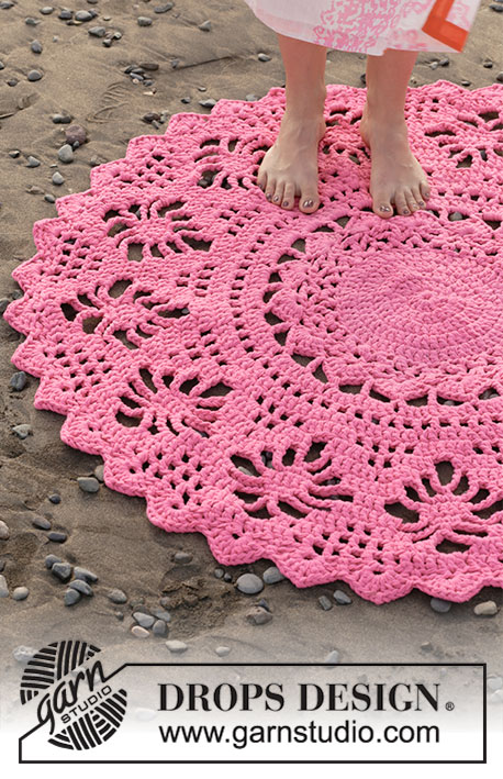 Spider Dance / DROPS 189-7 - Rug with lace pattern, crocheted from middle and outwards in a circle. Piece is crocheted in 3 strands DROPS Paris.