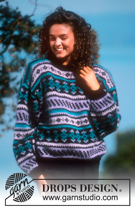 DROPS 19-7 - DROPS jumper with pattern borders in “Kid Mohair”. 