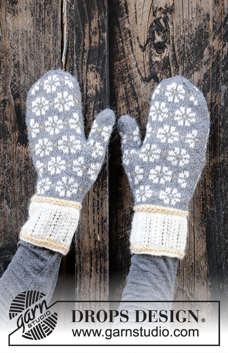 Winter Daisies / DROPS 193-7 - Knitted mittens in DROPS Nord. The piece is worked with Nordic pattern, Latvian cable and lace pattern. Size One-size.
Knitted socks in DROPS Nord. The piece is worked with Nordic pattern, Latvian cable and lace pattern. Sizes 35 – 43.