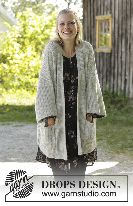 Cosy Josie / DROPS 195-18 - Knitted jacket in DROPS Puna. The piece is worked in textured pattern with v-neck, short sleeves and pockets. Sizes S - XXXL.