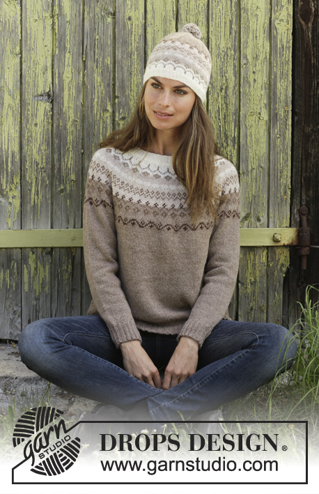 Talvik / DROPS 197-10 - Knitted jumper with round yoke in DROPS Alpaca. Piece is knitted top down with Nordic pattern. Size: S - XXXL 
Knitted hat with Nordic pattern and pompom in DROPS Alpaca.