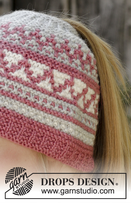 Hint of Heather Hat / DROPS 197-19 - Knitted hat in DROPS Nord. Piece is knitted bottom up in garter stitch, mosaic pattern and opening for ponytail.
