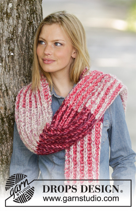 Raspberry Hug / DROPS 197-21 - Knitted scarf in DROPS Air and DROPS Brushed Alpaca Silk. Piece is knitted in uni-coloured English rib and 2-coloured English rib in stripes. The entire scarf is knitted in 2 strands DROPS Air and 1 strand DROPS Brushed Alpaca Silk.