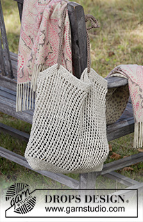 Seaside Life / DROPS 200-4 - Knitted bag in DROPS Bomull-Lin or DROPS Paris. The piece is worked in the round with lace pattern.