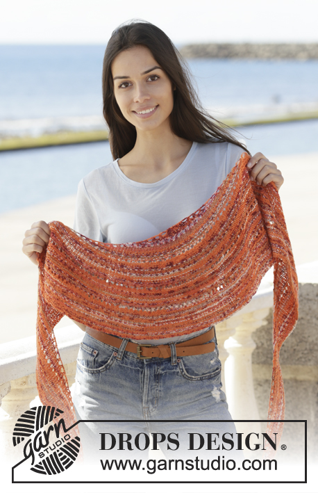 Solar Flares / DROPS 202-38 - Knitted shawl in DROPS Fabel. The piece is worked back and forth with garter stitch and rows of holes.