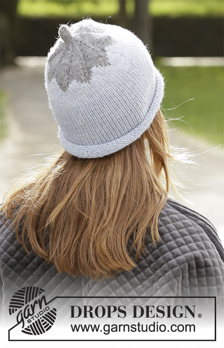 Frosty Berry / DROPS 204-39 - Knitted hat with tip in DROPS Nepal. Piece is knitted in the round in stocking stitch.