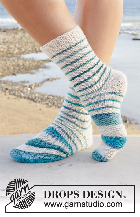 Horizon Trekkers / DROPS 209-24 - Knitted socks in DROPS Fabel. The piece is worked at an angle and with stripes, from the toe upwards. Sizes 35 – 43.