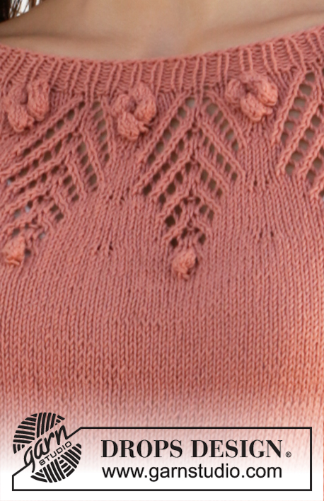 Copper Rose / DROPS 212-10 - Raglánový pulovr s kruhovým sedlem s ažurovým vzorem a ¾ rukávem pletený shora dolů z příze DROPS Safran. Velikost XS–XXL.