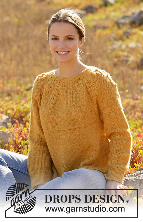 September Story Sweater / DROPS 213-25 - Knitted jumper with round yoke in DROPS Air. The piece is worked top down with bobbles. Sizes S - XXXL.