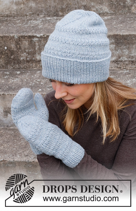 Pearl Essence / DROPS 214-27 - Knitted mittens and hat with textured pattern in DROPS Nepal.