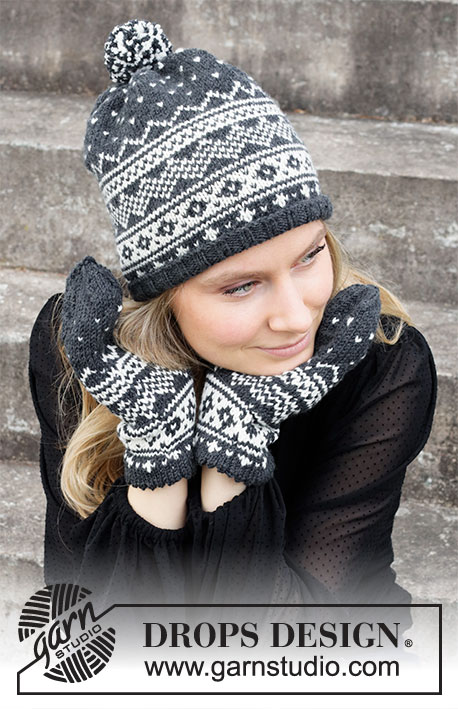 Winter's Night Enchantment Set / DROPS 214-50 - Knitted hat and mittens with Nordic pattern in DROPS Merino Extra Fine.