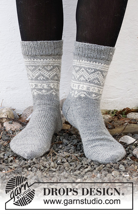 Highland Hikers / DROPS 214-53 - Knitted socks in DROPS Fabel. Piece is knitted top down with Nordic pattern. Size 35 - 43 = US 5 - 10 1/2
