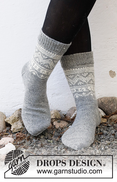 Highland Hikers / DROPS 214-53 - Knitted socks in DROPS Fabel. Piece is knitted top down with Nordic pattern. Size 35 - 43