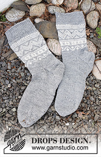 Highland Hikers / DROPS 214-53 - Knitted socks in DROPS Fabel. Piece is knitted top down with Nordic pattern. Size 35 - 43 = US 5 - 10 1/2