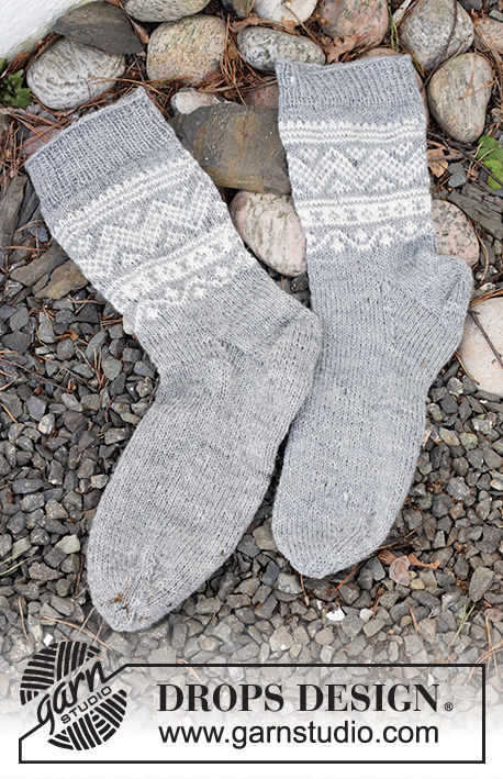 Highland Hikers / DROPS 214-53 - Knitted socks in DROPS Fabel. Piece is knitted top down with Nordic pattern. Size 35 - 43
