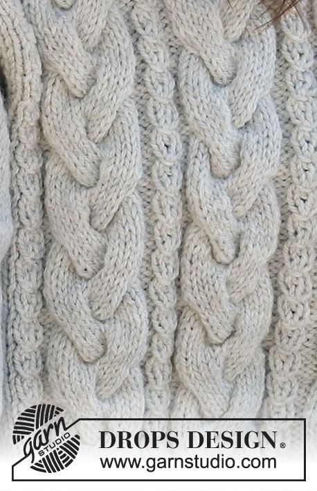 Columns of Valhalla / DROPS 217-15 - Knitted sweater in DROPS Alaska. The piece is worked with saddle shoulders, cables and split in the sides. Sizes S - XXXL.