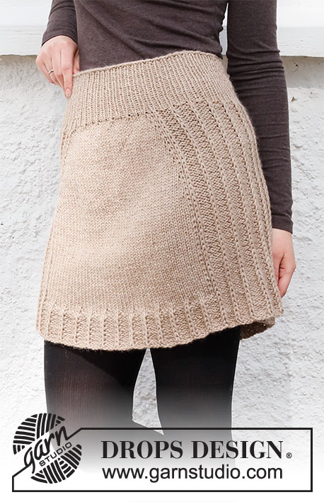 Swing Time / DROPS 218-24 - Knitted skirt in DROPS Nepal. The piece is worked top down with Fisherman’s rib on the sides. Sizes S - XXXL.