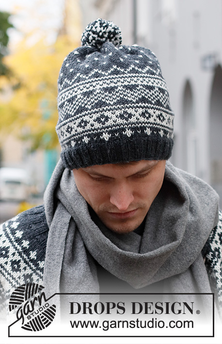 Winter's Night Enchantment Hat / DROPS 219-14 - Gorro tricotado para homem em DROPS Karisma. Tricota-se em redondo com jacquard norueguês.