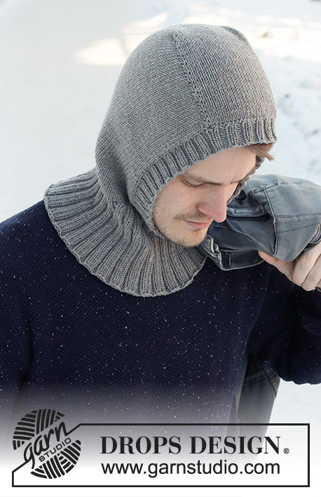 Uncharted Territory / DROPS 219-22 - Knitted hat / balaclava for men in DROPS Merino Extra Fine. The piece is worked top down with stocking stitch and ribbed edging.