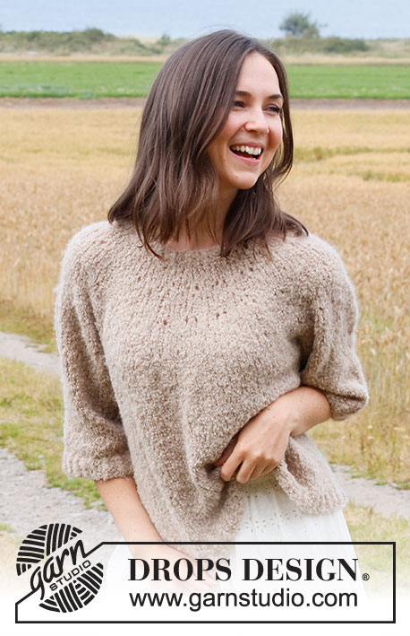 Crushed Walnuts Sweater / DROPS 222-15 - Knitted jumper in DROPS Alpaca Bouclé. The piece is worked top down with round yoke and ¾-length sleeves. Sizes S - XXXL.