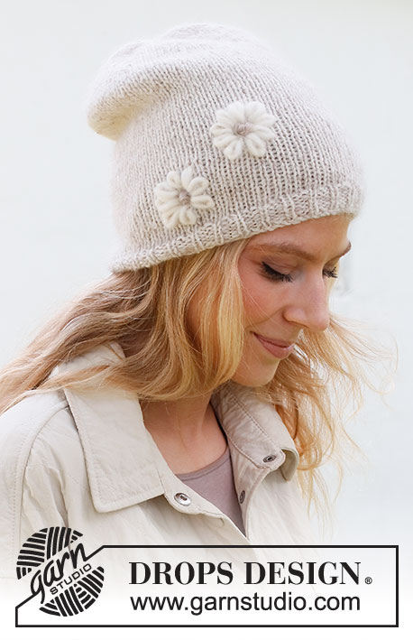 Just Daisy / DROPS 225-3 - Knitted hat in DROPS Sky and DROPS Kid-Silk. Piece is knitted with embroidered flowers.