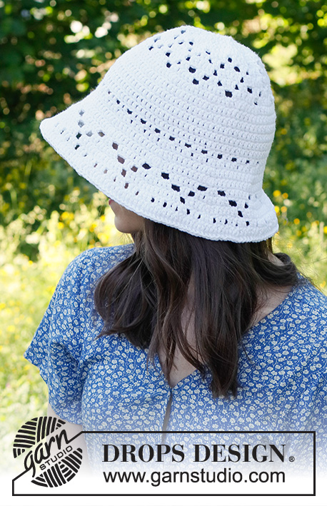 Breezy Belle Hat / DROPS 229-31 - Crocheted hat in DROPS Paris. Piece is crocheted top down with lace pattern.