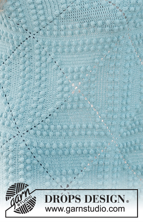 Rain Puddles / DROPS 229-6 - Crocheted blanket with bobbles in DROPS Sky. The piece is worked in squares.