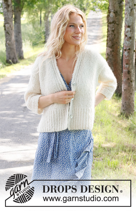 Soft Journey Cardigan / DROPS 230-10 - Knitted jacket in DROPS Alpaca Bouclé and DROPS Kid-Silk. The piece is worked bottom up in stocking stitch with split in the sides and ¾-length sleeves. Sizes S - XXXL.