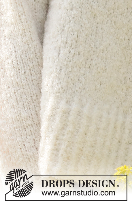White Dandelion / DROPS 230-31 - Gebreide trui in DROPS Alpaca Bouclé en DROPS Kid-Silk. Het werk wordt van onder naar boven gebreid n tricotsteek en split in de zijkanten. Maten S - XXXL.